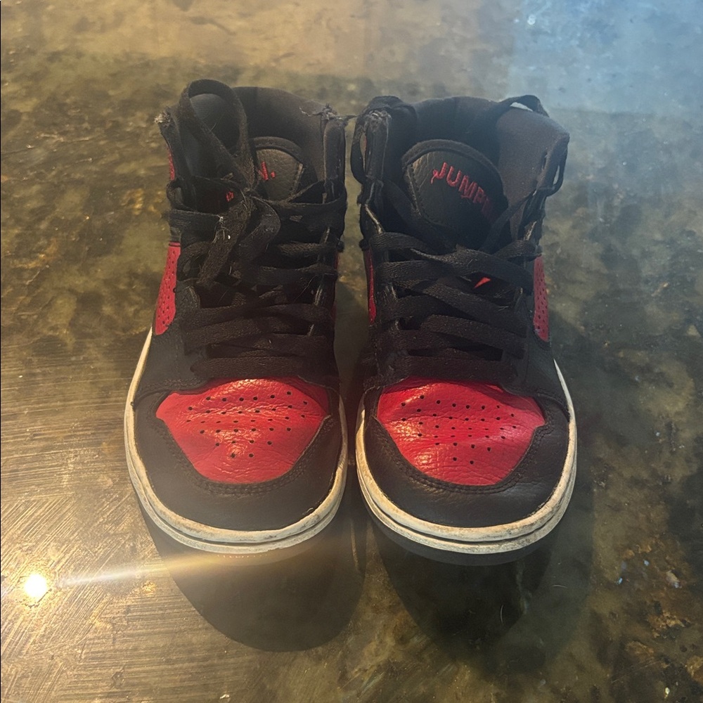 air jordan black and white high top sneakers